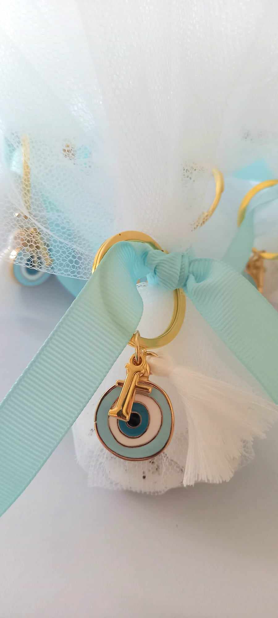 Μπομπονιέρα βάπτισης με μπρελόκ με μάτι και μονόγραμμα