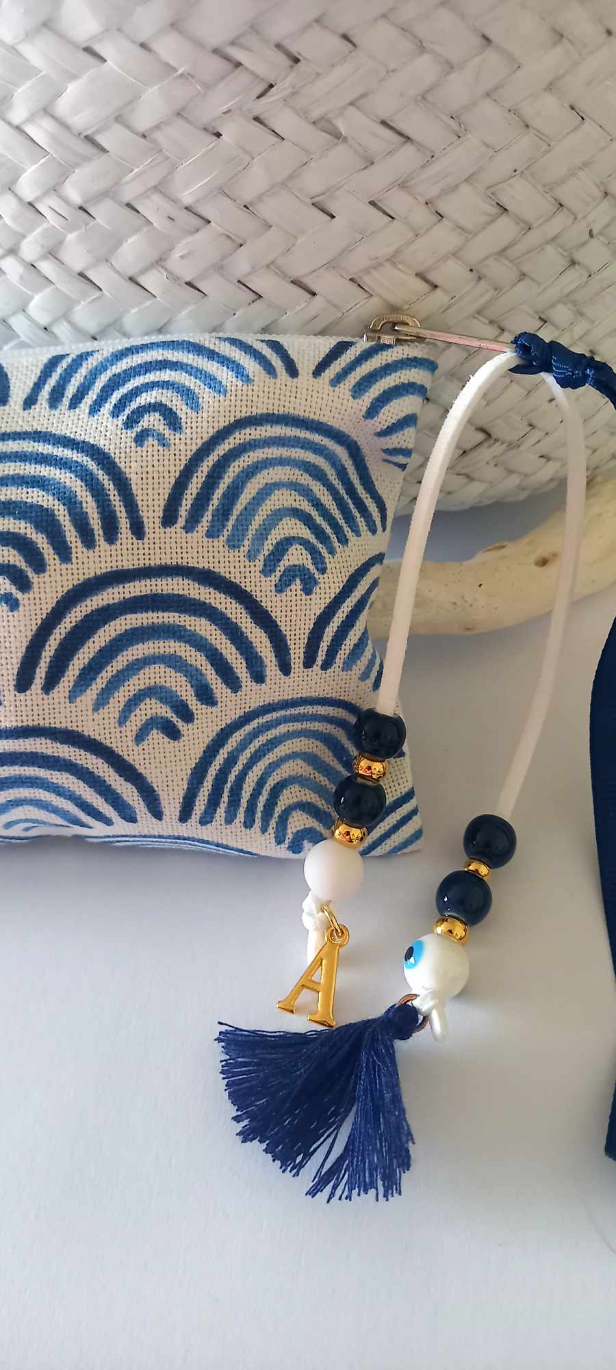 Μπομπονιέρα βάπτισης πορτοφολάκι με διακοσμητικό μπεγλέρι