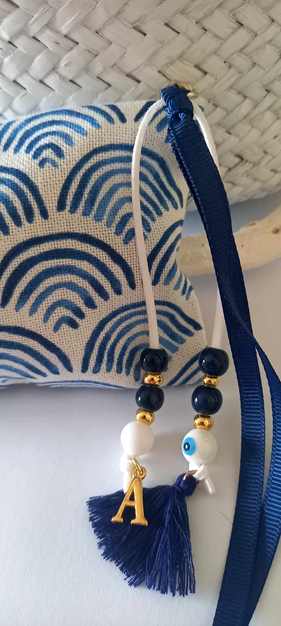 Μπομπονιέρα βάπτισης πορτοφολάκι με διακοσμητικό μπεγλέρι