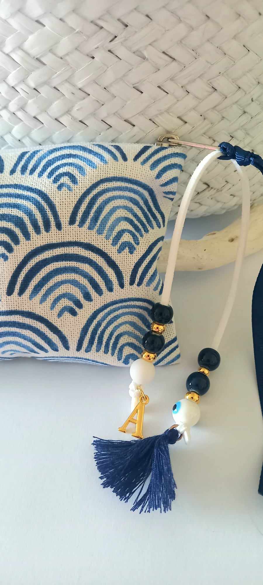 Μπομπονιέρα βάπτισης πορτοφολάκι με διακοσμητικό μπεγλέρι