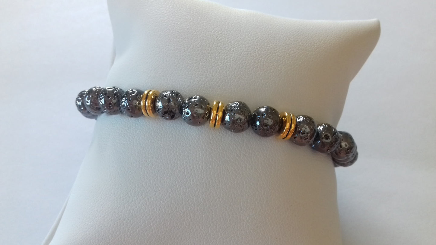 Βραχιόλι με επιμεταλλωμένη λάβα και χρυσές λεπτομέρειες