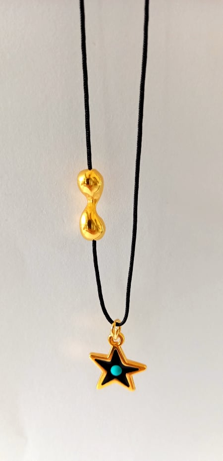 Χειροποίητο κολιέ με επιχρυσωμένο αστέρι και συνδετικό μοτίφ
