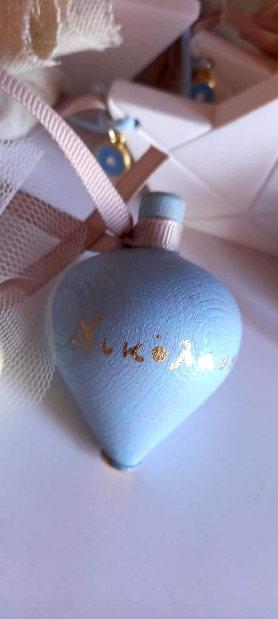 Μπομπονιέρα βάπτισης σβούρα με όνομα