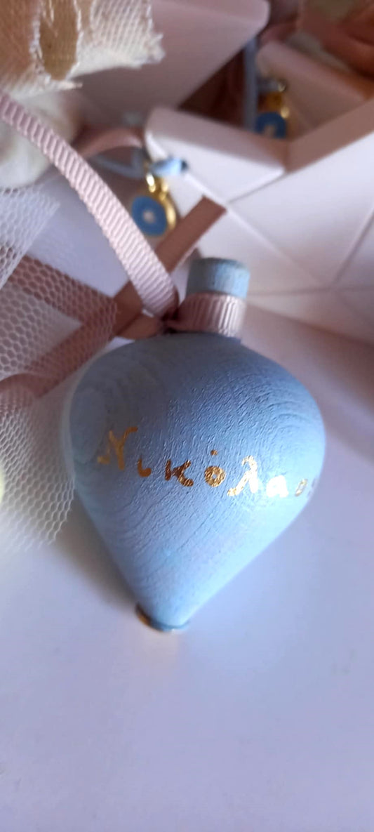 Μπομπονιέρα βάπτισης σβούρα με όνομα