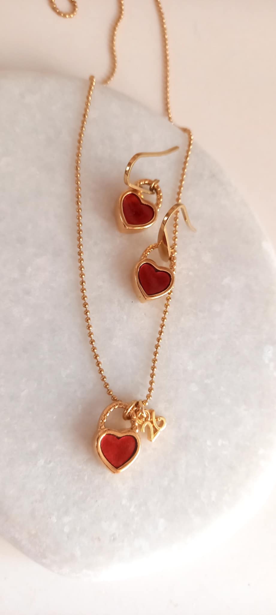 Σκουλαρίκια από ατσάλι με μοτίφ καρδιές