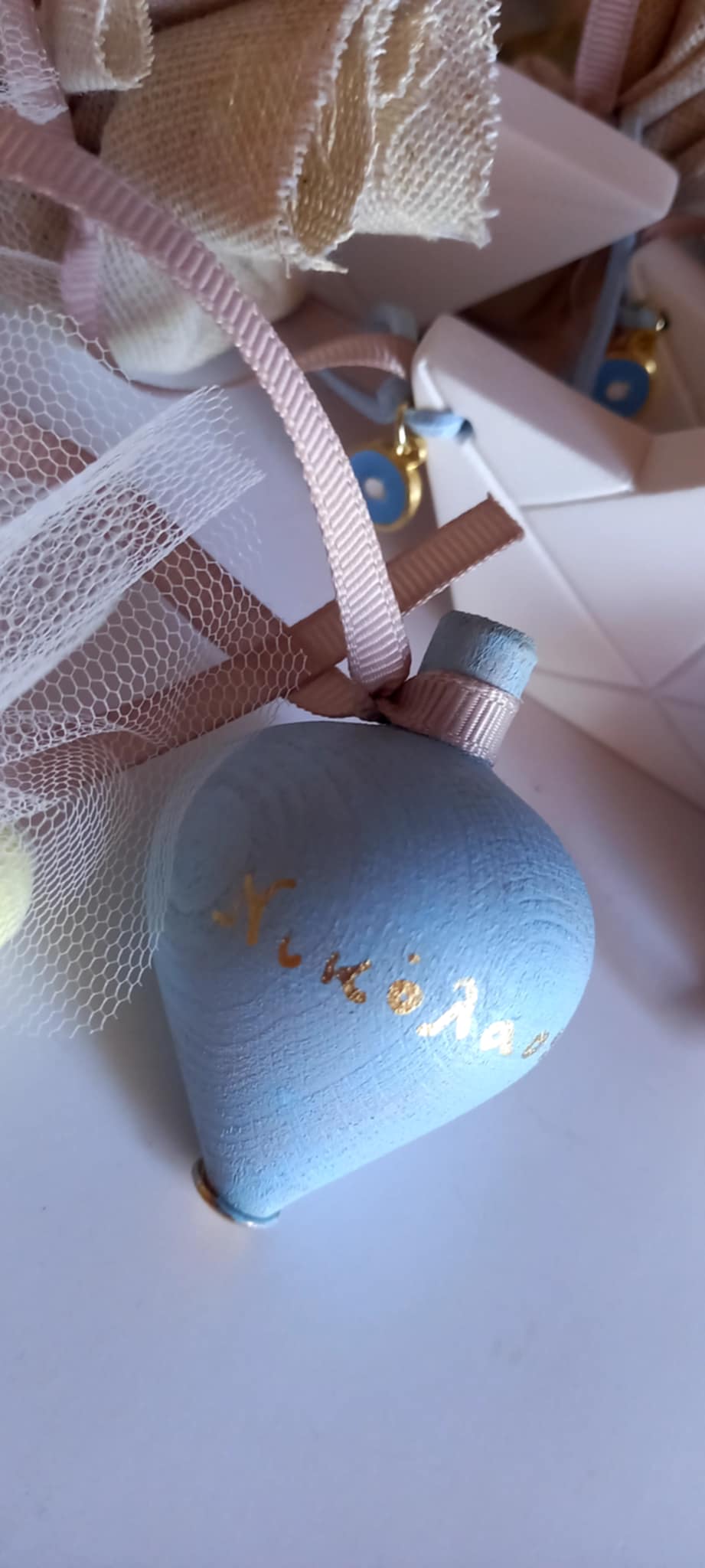 Μπομπονιέρα βάπτισης σβούρα με όνομα