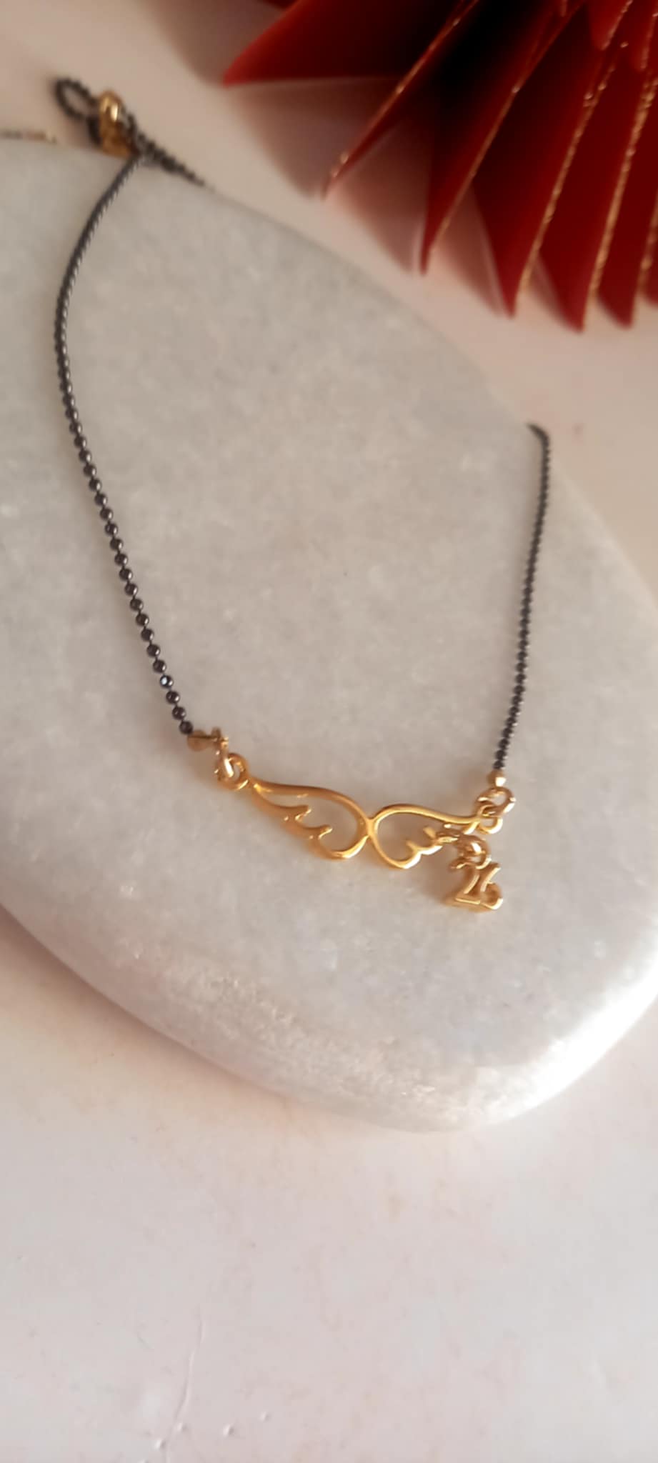 Κολιέ - γούρι με φτερά αγγέλου