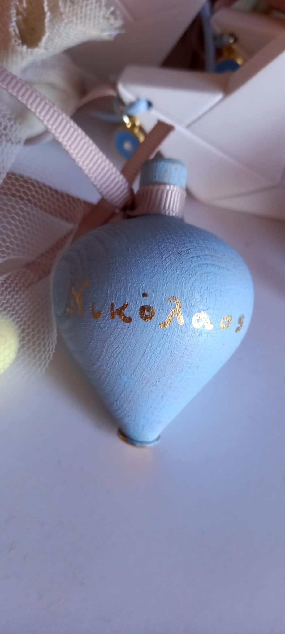 Μπομπονιέρα βάπτισης σβούρα με όνομα