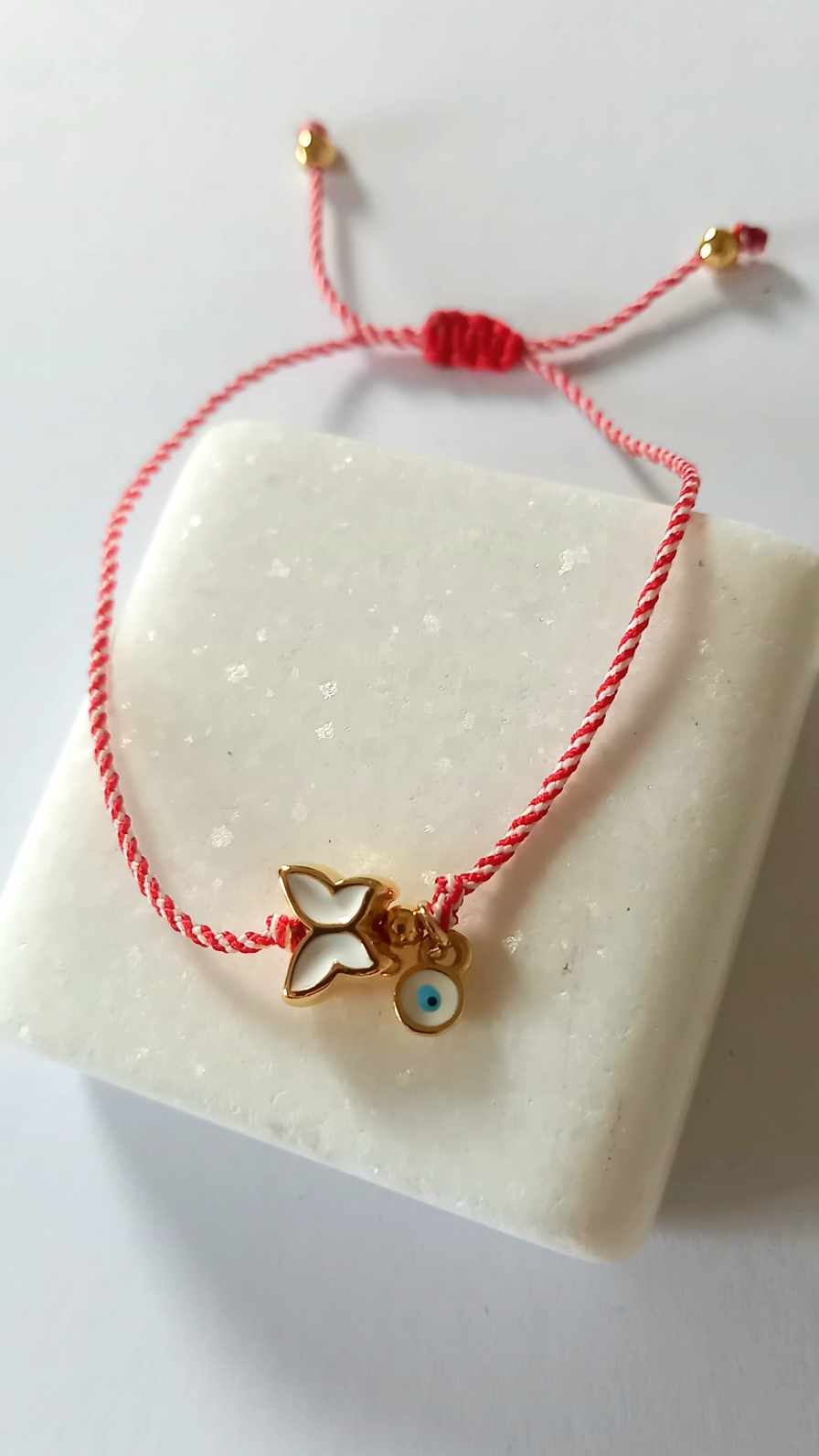 Χειροποίητο βραχιόλι μαρτάκι με επιχρυσωμένο λουλούδι και μάτι
