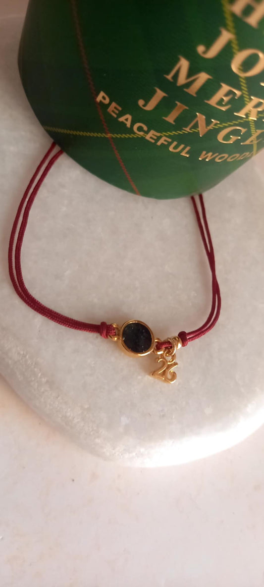 Βραχιόλι - γούρι 2026 με λαμπερό μοτίφ