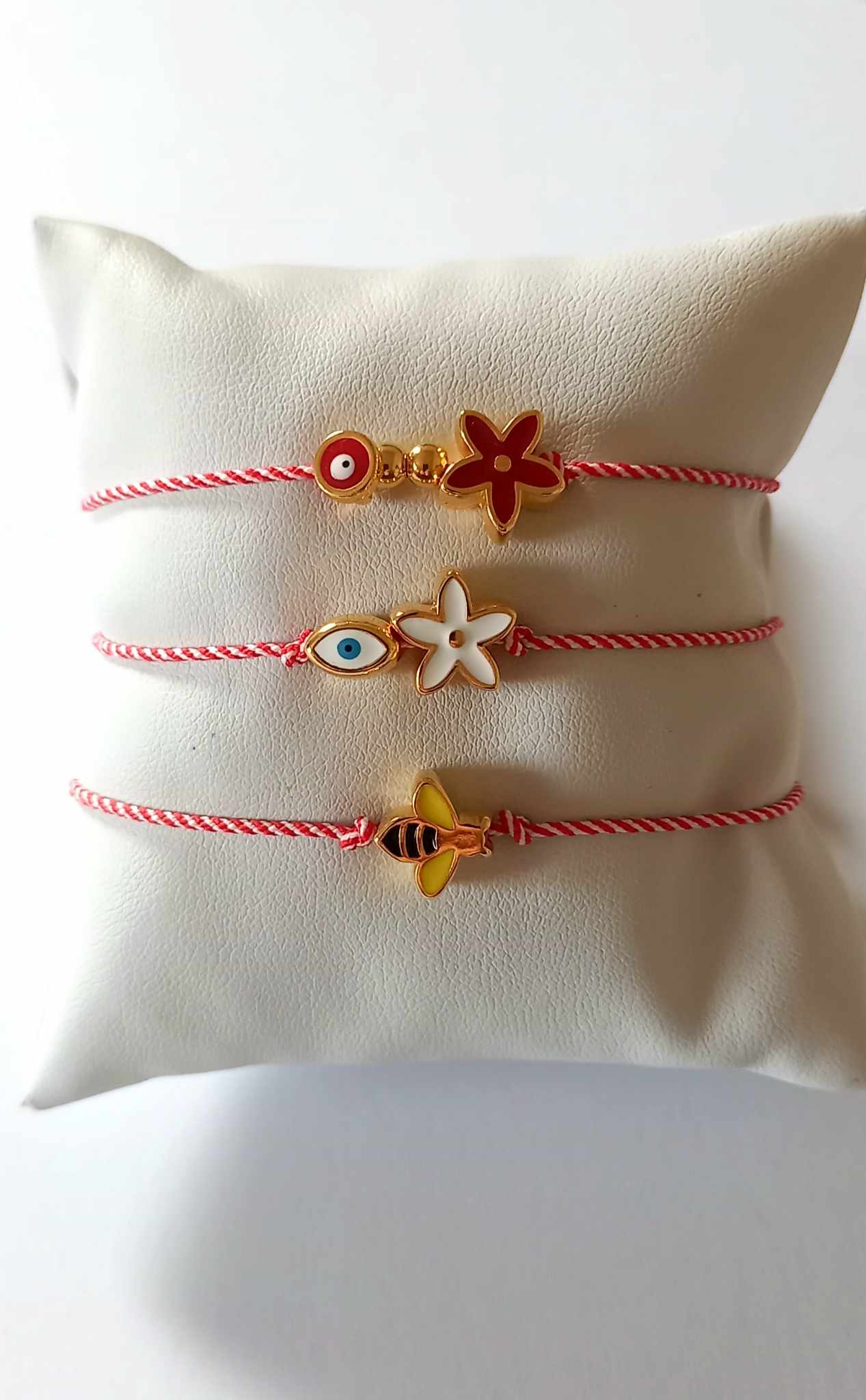 Χειροποίητο βραχιόλι μαρτάκι με επιχρυσωμένο λουλούδι και μάτι