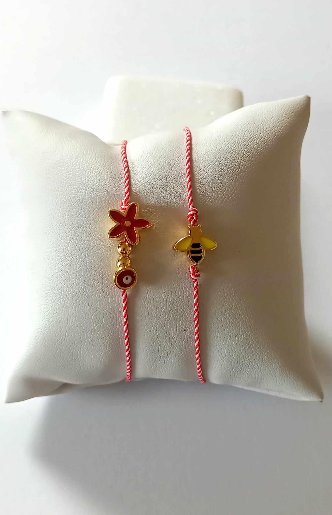 Χειροποίητο βραχιόλι μαρτάκι με επιχρυσωμένο λουλούδι και μάτι