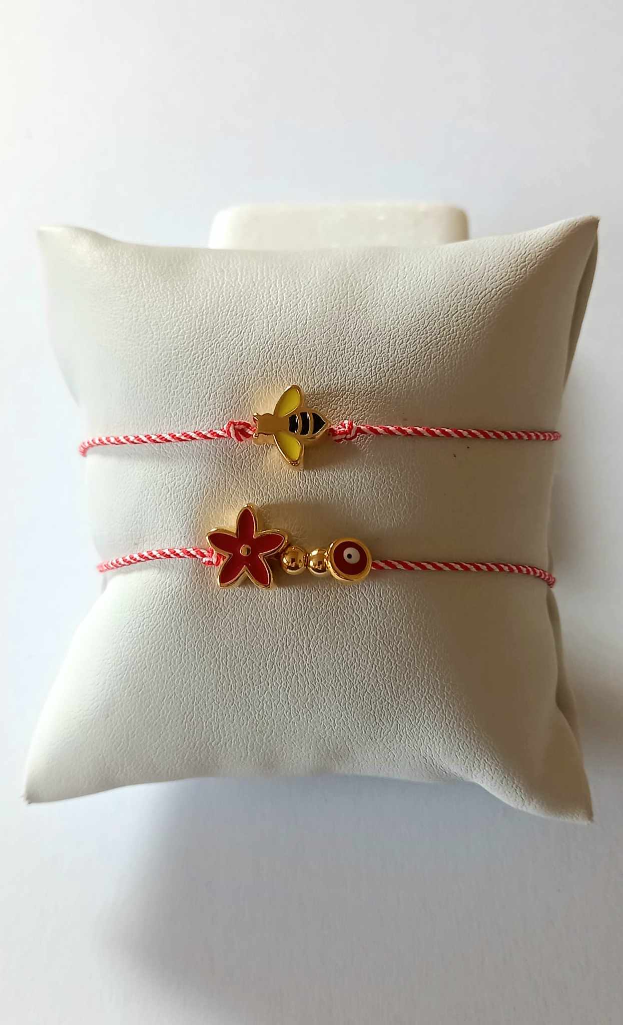 Χειροποίητο βραχιόλι μαρτάκι με επιχρυσωμένο λουλούδι και μάτι