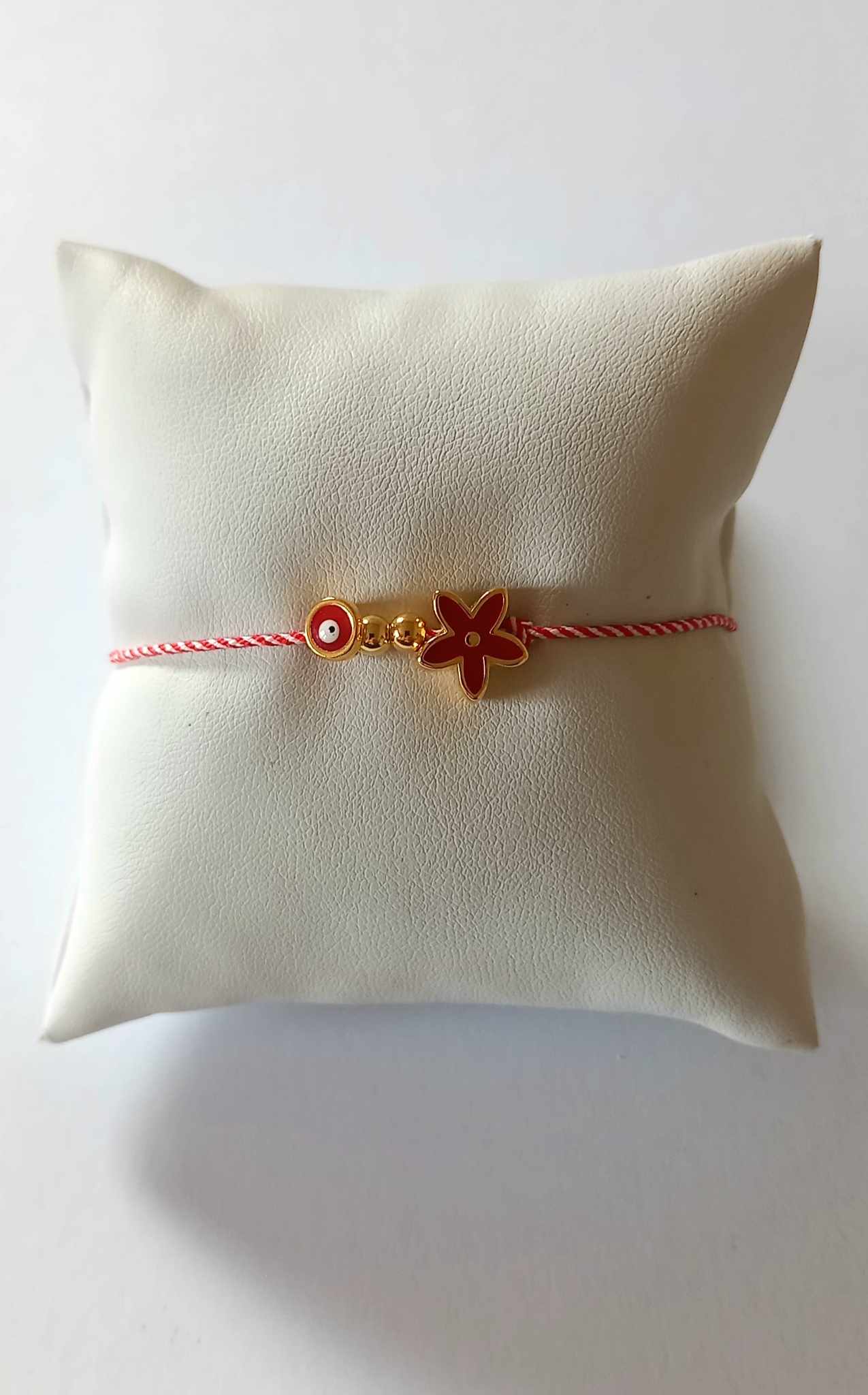 Χειροποίητο βραχιόλι μαρτάκι με επιχρυσωμένο λουλούδι και μάτι
