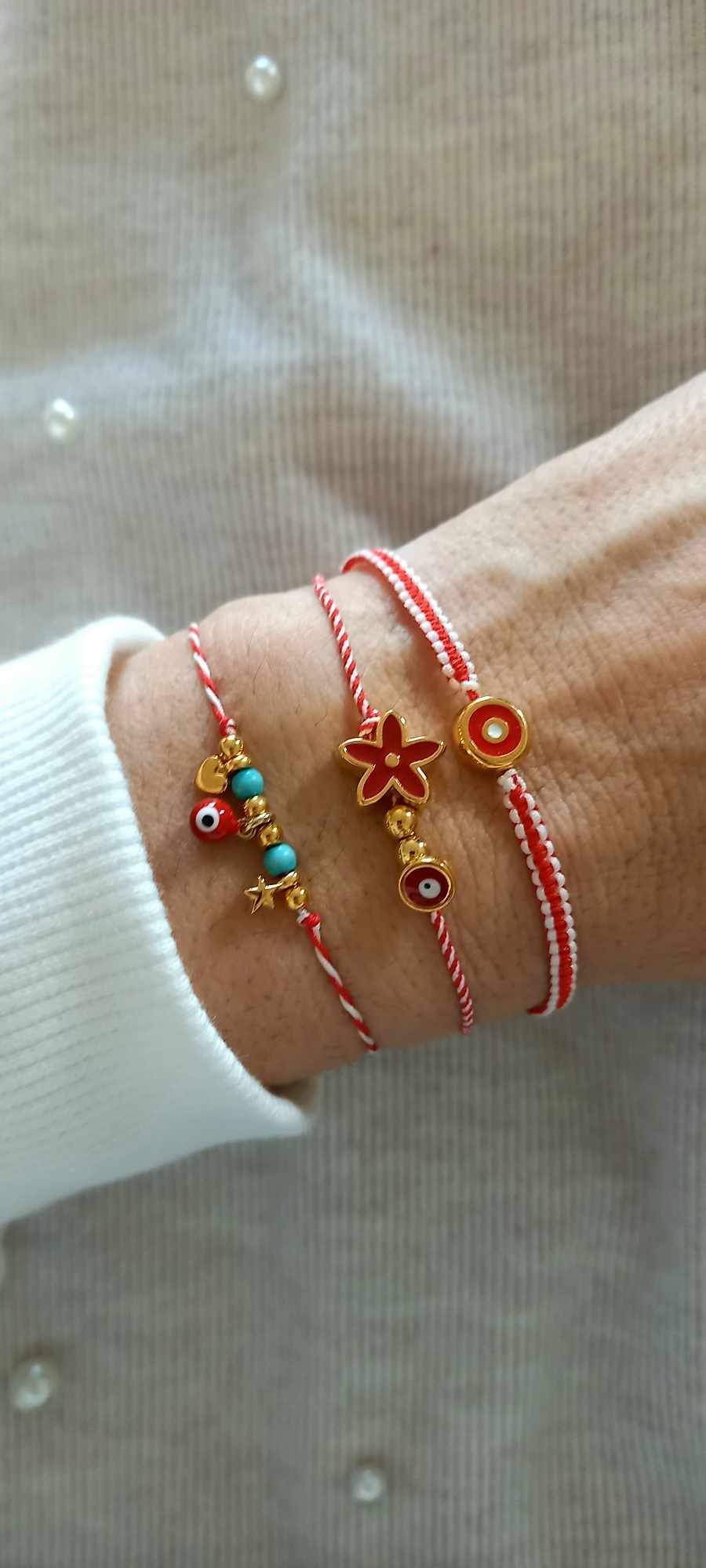 Χειροποίητο βραχιόλι μαρτάκι με επιχρυσωμένο λουλούδι και μάτι