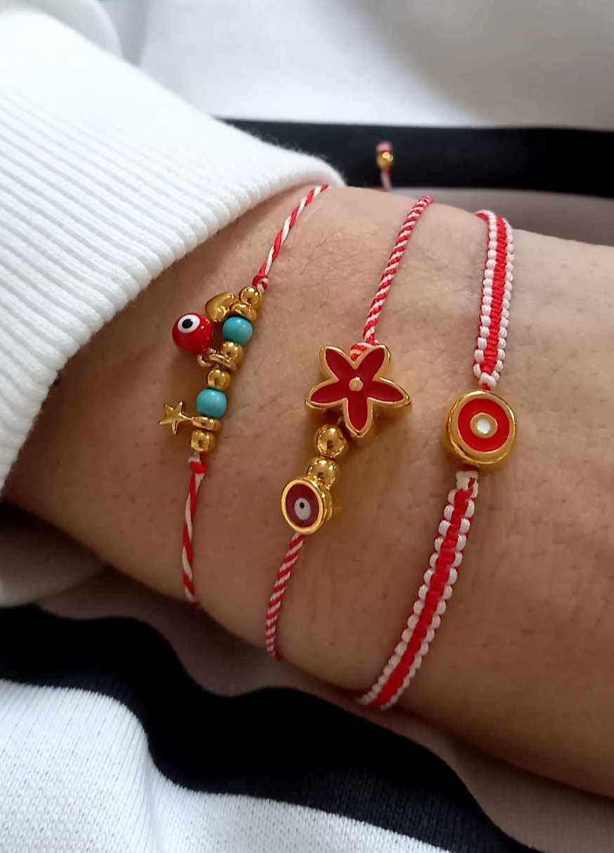 Χειροποίητο βραχιόλι μαρτάκι με επιχρυσωμένο λουλούδι και μάτι