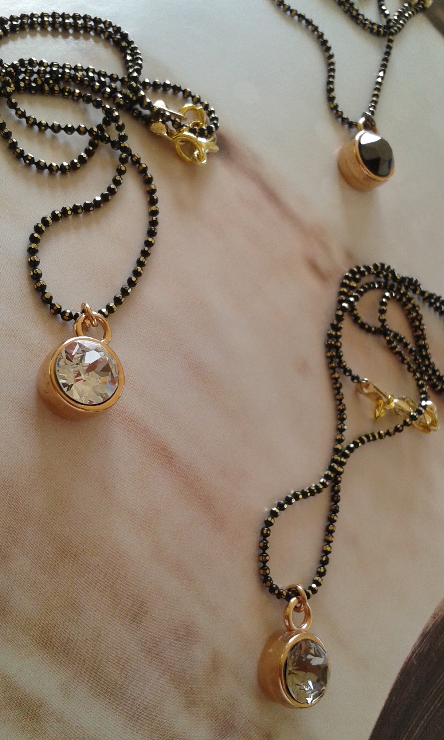 Short ball chain necklace with crystal pendant