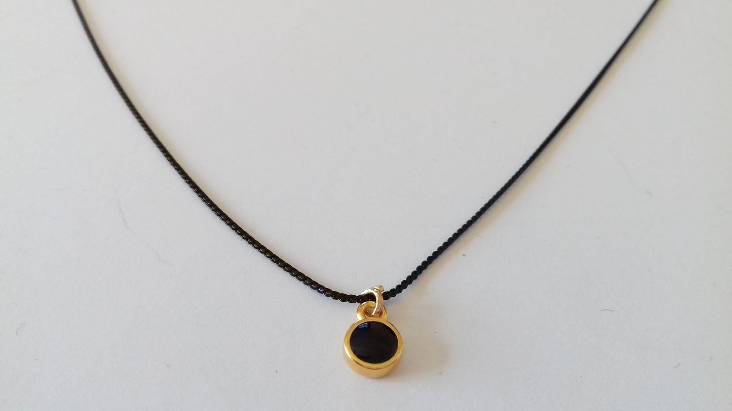 Tiny black enamel round pendant necklace