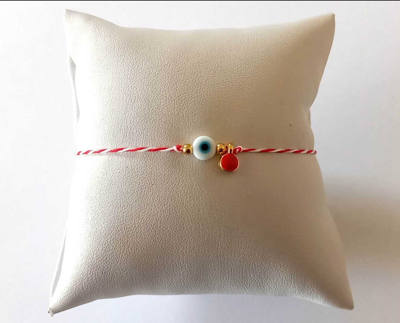 Χειροποίητο μαρτάκι με μάτι και στοιχείο με κόκκινο σμάλτο